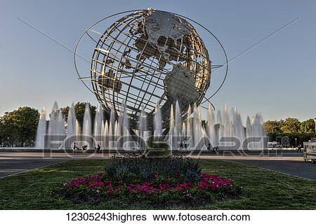 Stock Photograph - Fountains around the Unisphere at sunset, Flushing Meadows-Corona Park; Queens, New York, United States of America. Fotosearch