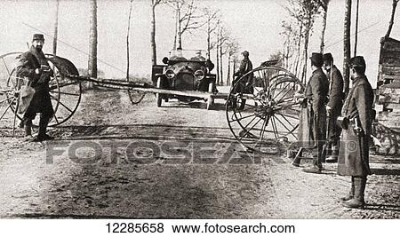 French soldiers at Verdun, France block the road and check all passing vehicles for contents and destination during World War One. From The Pageant of the Century, published 1934 View Large Photo Image Stock Photo - French soldiers at Verdun, France block the road and check all passing vehicles for contents and destination during World War One. From The Pageant of the Century, published 1934. Fotosearch