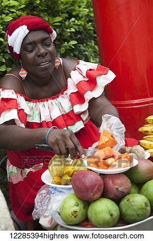Stock Photograph - Fruit seller; Cartagena, Columbia. Fotosearch
