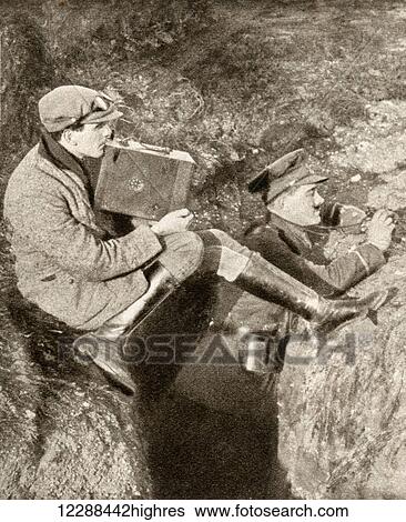 Stock Photograph - Geoffrey Malins, 1886-1940, cinematographer, seen here in the fighting line during World War One. From The Pageant of the Century, published 1934. Fotosearch