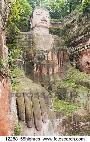 Stock Photograph - Giant Buddha from Leshan, the largest stone statue of Buddha around the world, 71 metres tall; Sichuan province, China. Fotosearch