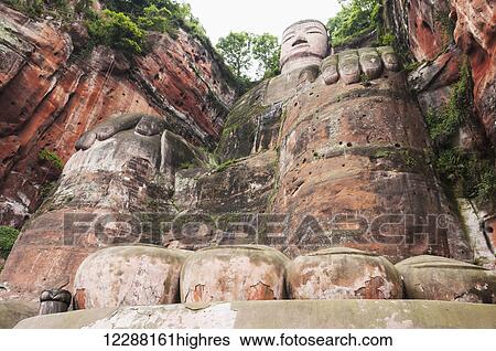Stock Photograph - Giant Buddha from Leshan, the largest stone statue of Buddha around the world, 71 metres tall; Sichuan province, China. Fotosearch