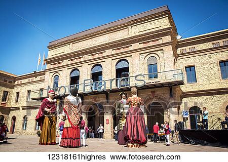 Giants from 0u Barris district during Saint George's Day festivities; Barcelona, Catalonia, Spain View Large Photo Image Stock Photograph - Giants from 0u Barris district during Saint George's Day festivities; Barcelona, Catalonia, Spain. Fotosearch