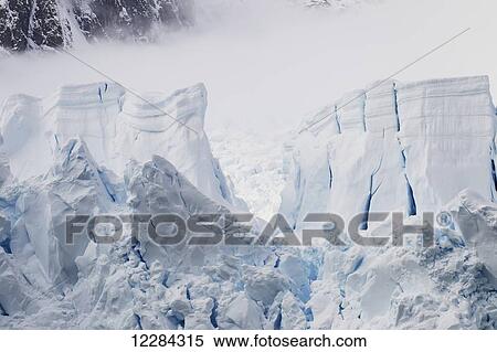 Glacier calving into Paradise Harbor, Antarctic Peninsula; Antarctica View Large Photo Image Stock Photography - Glacier calving into Paradise Harbor, Antarctic Peninsula; Antarctica. Fotosearch