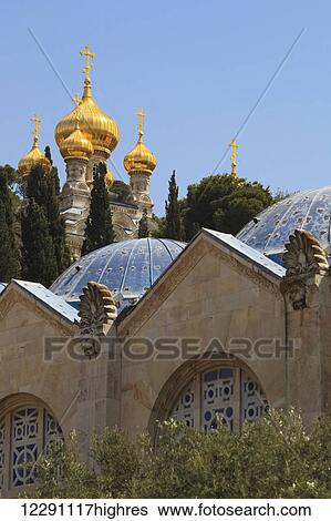 Gold onion domes topped with crosses against a blue sky; Jerusalem, Israel View Large Photo Image Stock Photograph - Gold onion domes topped with crosses against a blue sky; Jerusalem, Israel. Fotosearch