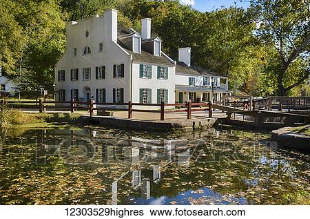 Great Falls Tavern Visitor Center, Chesapeake and Ohio Canal National Historical Park, originally a locktender's house and expanded in 1832 as a hotel, canal and lock #20 visible foreground; Potomac, Maryland, United States of America View Large Photo Image Stock Photograph - Great Falls Tavern Visitor Center, Chesapeake and Ohio Canal National Historical Park, originally a locktender's house and expanded in 1832 as a hotel, canal and lock #20 visible foreground; Potomac, Maryland, United States of America. Fotosearch