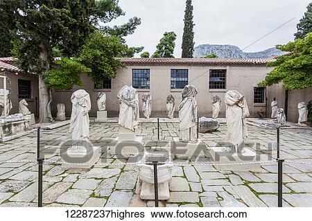 Stock Photograph - Headless statues at an archaeological museum; Corinth, Greece. Fotosearch