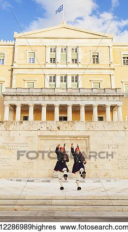 Hellenic Parliament, the Parliament of Greece, located in the Parliament House overlooking Syntagma Square; Athens, Greece View Large Photo Image Stock Photograph - Hellenic Parliament, the Parliament of Greece, located in the Parliament House overlooking Syntagma Square; Athens, Greece. Fotosearch
