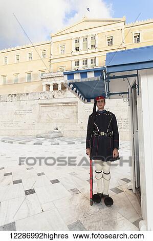 Stock Photograph - Hellenic Parliament, the Parliament of Greece, located in the Parliament House overlooking Syntagma Square; Athens, Greece. Fotosearch