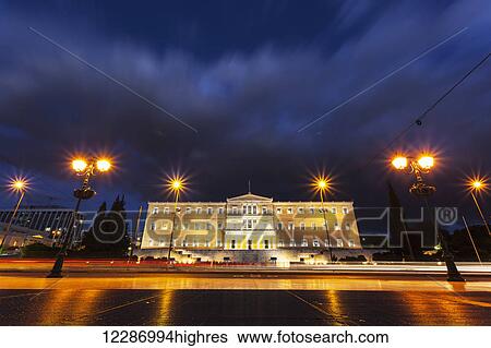 Stock Photograph - Hellenic Parliament, the Parliament of Greece, located in the Parliament House overlooking Syntagma Square; Athens, Greece. Fotosearch