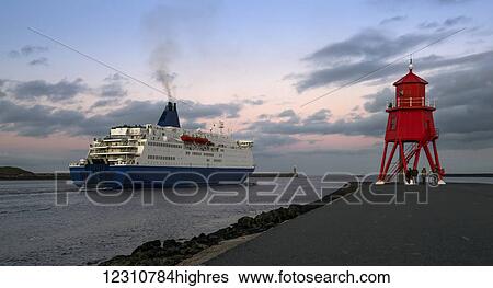 Herd Groyne lighthouse and a cruise ship in the Port of Tyne; South Shields, Tyne and Wear, England View Large Photo Image Stock Photograph - Herd Groyne lighthouse and a cruise ship in the Port of Tyne; South Shields, Tyne and Wear, England. Fotosearch