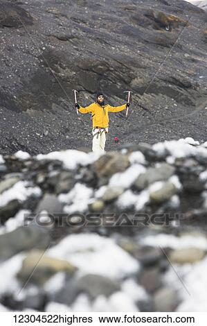 Hiking through the Solheimajokull glacier; Solheimajokull, Iceland View Large Photo Image Stock Photograph - Hiking through the Solheimajokull glacier; Solheimajokull, Iceland. Fotosearch