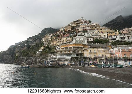 Houses on the hillside and boats on the beach along the Amalfi coast; Positano, Campania, Italy View Large Photo Image Stock Photograph - Houses on the hillside and boats on the beach along the Amalfi coast; Positano, Campania, Italy. Fotosearch