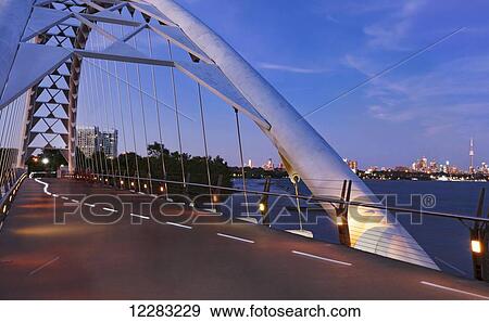 Humber Bay Arch Bridge at dusk; Toronto, Ontario, Canada View Large Photo Image Stock Photo - Humber Bay Arch Bridge at dusk; Toronto, Ontario, Canada. Fotosearch
