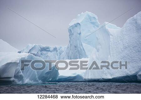 Iceberg graveyard behind Pleneau Island near Lemaire Channel; Antarctica View Large Photo Image Stock Photo - Iceberg graveyard behind Pleneau Island near Lemaire Channel; Antarctica. Fotosearch