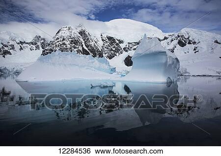 Stock Photograph - Iceberg in Paradise Harbour, Antarctic Peninsula; Antarctica. Fotosearch