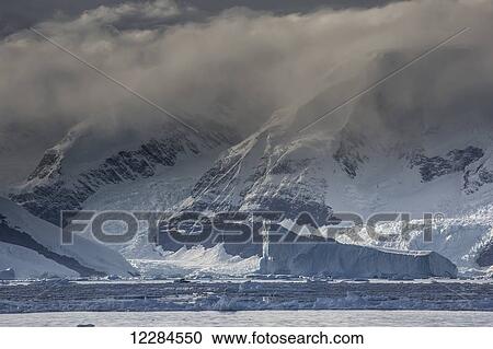 Icebergs in front of Anvers Island along Gerlache Strait, Antarctic Peninsula; Antarctica View Large Photo Image Stock Image - Icebergs in front of Anvers Island along Gerlache Strait, Antarctic Peninsula; Antarctica. Fotosearch