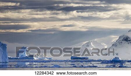 Stock Image - Icebergs in front of Neko Harbor, Antarctic Peninsula; Antarctica. Fotosearch