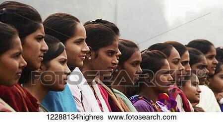 Indian girls posing for a photo; New Delhi, Delhi, India View Large Photo Image Stock Photograph - Indian girls posing for a photo; New Delhi, Delhi, India. Fotosearch
