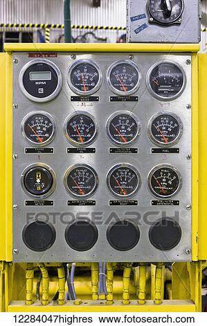 Indicator readouts and switches on a control panel at an electrical power plant, Sand Point, Southwestern Alaska, USA View Large Photo Image Stock Photograph - Indicator readouts and switches on a control panel at an electrical power plant, Sand Point, Southwestern Alaska, USA. Fotosearch