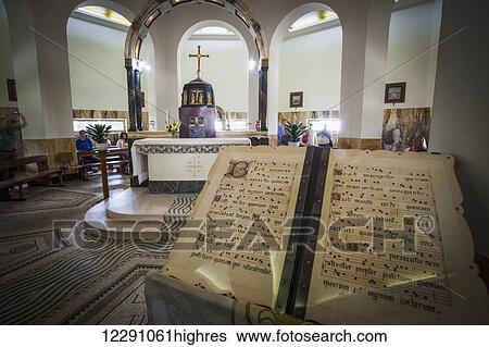 Interior of a church with altar and podium with sheet music on display; Galilee, Israel View Large Photo Image Stock Photograph - Interior of a church with altar and podium with sheet music on display; Galilee, Israel. Fotosearch