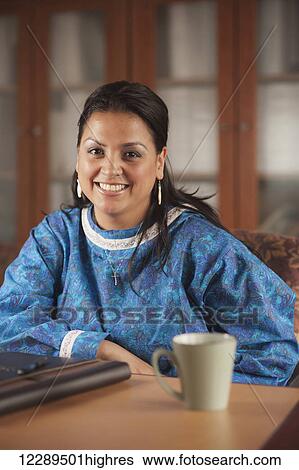 Inupiaq professional woman sitting at a conference table, Barrow, North Slope, Arctic Alaska View Large Photo Image Stock Photograph - Inupiaq professional woman sitting at a conference table, Barrow, North Slope, Arctic Alaska. Fotosearch