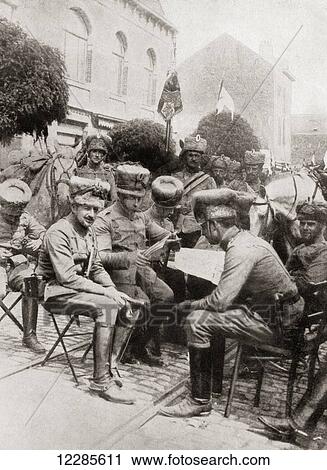 Stock Image - Invading German cavalry in Brussels during WWI. From The War Illustrated Album Deluxe, published 1915.. Fotosearch