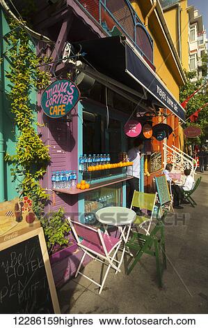 Stock Photograph - Istanbul street scene with cafes near the main tourist attractions; Istanbul, Turkey. Fotosearch
