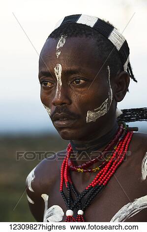Stock Photograph - Kara tribe warrior; Ethiopia. Fotosearch