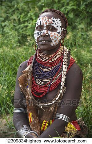 Stock Photograph - Kara warrior, Omo Valley; Ethiopia. Fotosearch