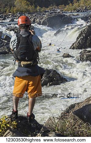 Kayaker filming others whitewater kayaking rapids in the Potomac River, Great Falls Park; Maryland, United States of America View Large Photo Image Stock Photograph - Kayaker filming others whitewater kayaking rapids in the Potomac River, Great Falls Park; Maryland, United States of America. Fotosearch