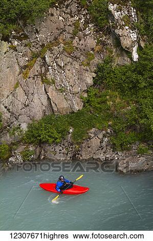 Kayaker in Portage Creek at the edge of Portage Lake, Southcentral Alaska, USA View Large Photo Image Stock Photograph - Kayaker in Portage Creek at the edge of Portage Lake, Southcentral Alaska, USA. Fotosearch