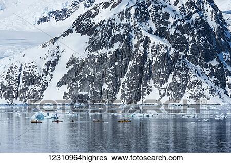 Stock Photograph - Kayaking in Neko harbour; Antarctica. Fotosearch