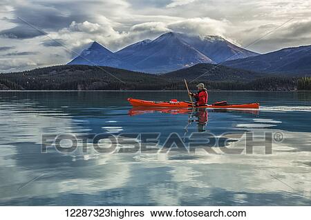 Kayaking on Atlin Lake; Atlin, British Columbia, Canada View Large Photo Image Stock Photograph - Kayaking on Atlin Lake; Atlin, British Columbia, Canada. Fotosearch