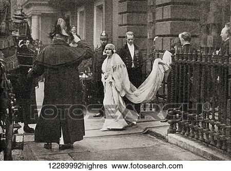 Stock Photograph - Lady Elizabeth Bowes Lyon on her way to her wedding on April 26, 1923, to H. R. H. The Duke of York, later King George VI. Elizabeth Angela Marguerite Bowes-Lyon, 1900 2002. George VI, 1895 1952. King of the United Kingdom. From The Story of.... Fotosearch