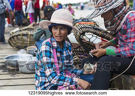 Stock Photograph - Local life in the famous Crab Market; Kep, Cambodia. Fotosearch