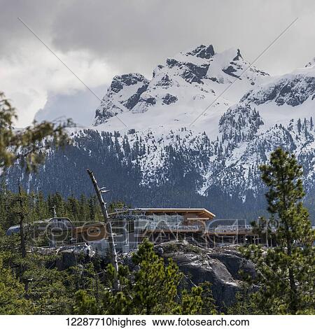 Stock Photograph - Lookout and building for Sea to Sky Gondola over Coast Mountains; Squamish, British Columbia, Canada. Fotosearch