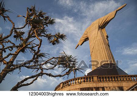 Stock Photograph - Low angle view of Christ the Redeemer statue from behind; Rio de Janeiro, Brazil. Fotosearch