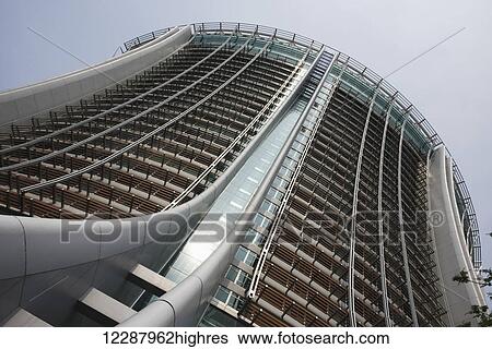 Stock Photograph - Low angle view of the sun reflected in the Lily; Hong Kong, China. Fotosearch