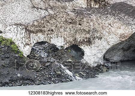 Stock Photograph - Lowe River flows past the remains of the avalanche that had closed Keystone Canyon, Valdez, Southcentral Alaska, USA, Summer. Fotosearch