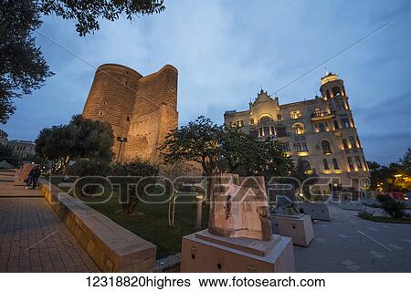 Stock Photograph - Maiden Tower and House of Hajinsky; Baku, Azerbaijan. Fotosearch