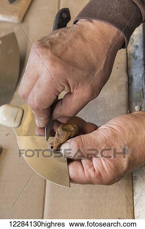 Stock Photograph - Male native artist making an Ulu, Inupiat Heritage Center, Barrow, North Slope, Arctic Alaska, USA. Fotosearch