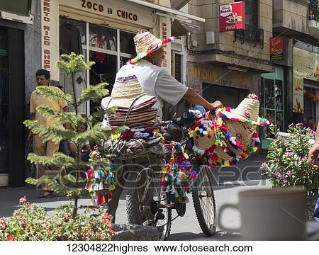 Man selling hats on the street; Tangier, Morocco View Large Photo Image Stock Photograph - Man selling hats on the street; Tangier, Morocco. Fotosearch