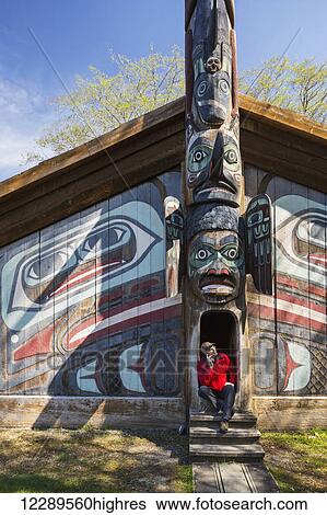 Man sits on steps of a Tlingit clan house with smart phone, Totem Bight Historic State Park, Ketchikan, Southeast Alaska, USA, Spring View Large Photo Image Stock Photograph - Man sits on steps of a Tlingit clan house with smart phone, Totem Bight Historic State Park, Ketchikan, Southeast Alaska, USA, Spring. Fotosearch