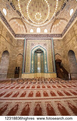 Stock Photograph - Mihrab and minbar in the Prayer Hall of the Juma Mosque of Shamakhi or Friday Mosque of Shamakhi; Shamakhi, Azerbaijan. Fotosearch