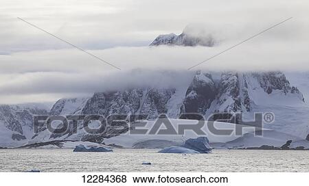 Mountains and glacier near Lemaire Channel, Antarctic Peninsula; Antarctica View Large Photo Image Stock Photo - Mountains and glacier near Lemaire Channel, Antarctic Peninsula; Antarctica. Fotosearch