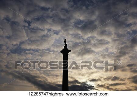 Stock Photograph - Nelson's Column in Trafalgar Square at sunset; London, England. Fotosearch
