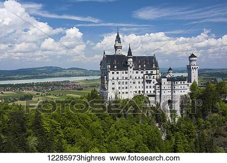 Stock Photograph - Neuschwanstein Castle overlooking the Banwaldsee, near the town of Fussen; Bavaria, Germany. Fotosearch