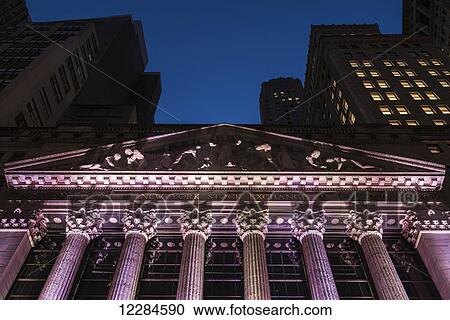 Stock Image - New York Stock Exchange at twilight; New York City, New York, United States of America. Fotosearch