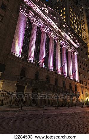 Stock Image - New York Stock Exchange at twilight; New York City, New York, United States of America. Fotosearch